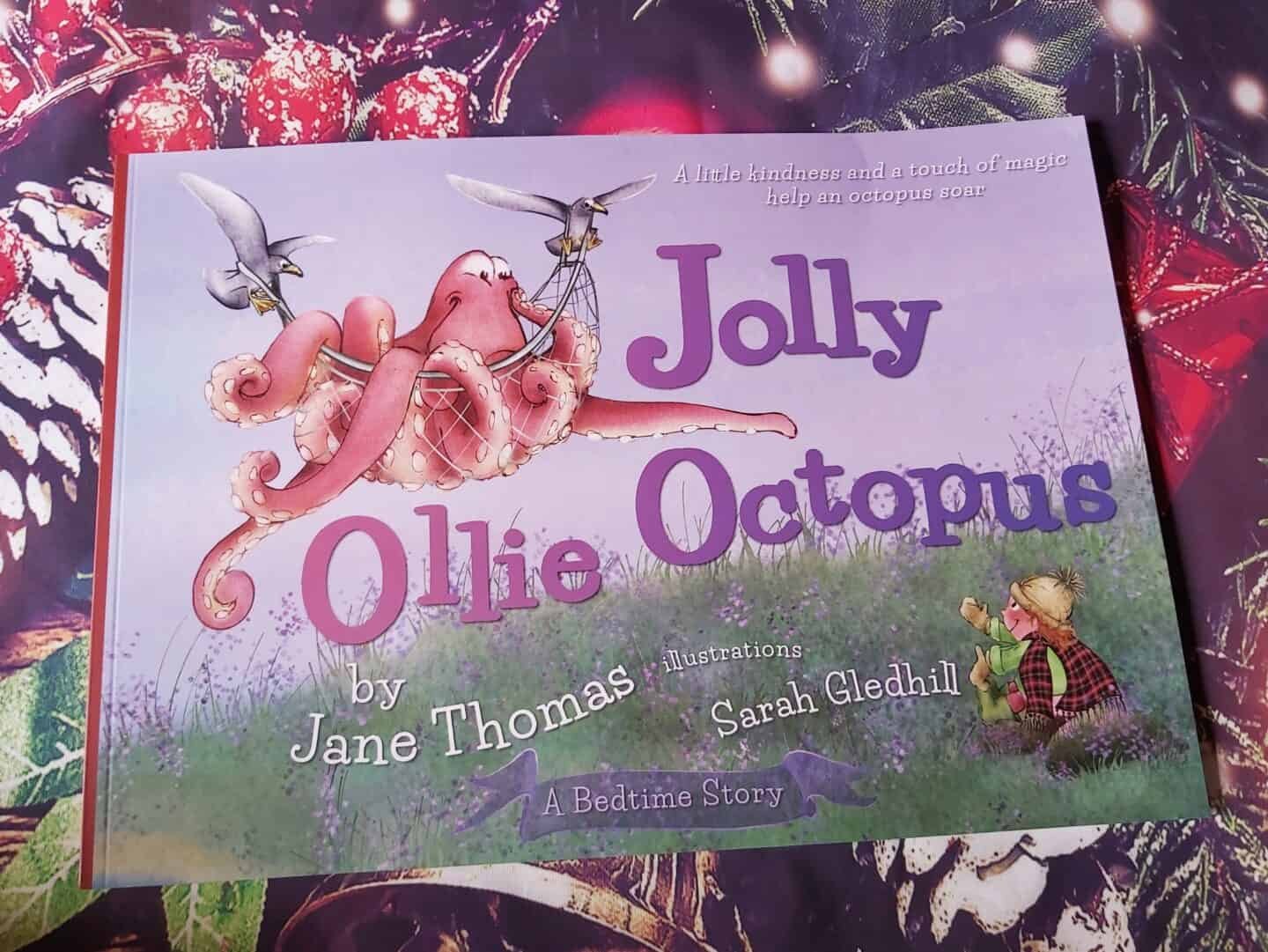 Jolly Ollie Octopus book on Christmas background