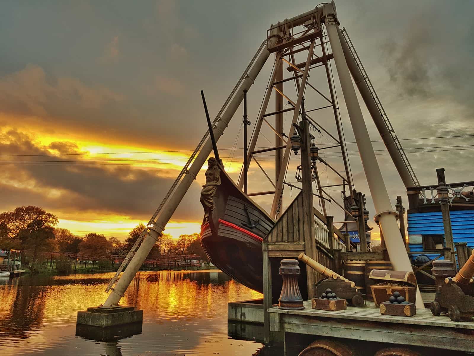 Sunset over the pirate ship at Drayton Manor Theme Park and Zoo in Tamworth, Staffordshire