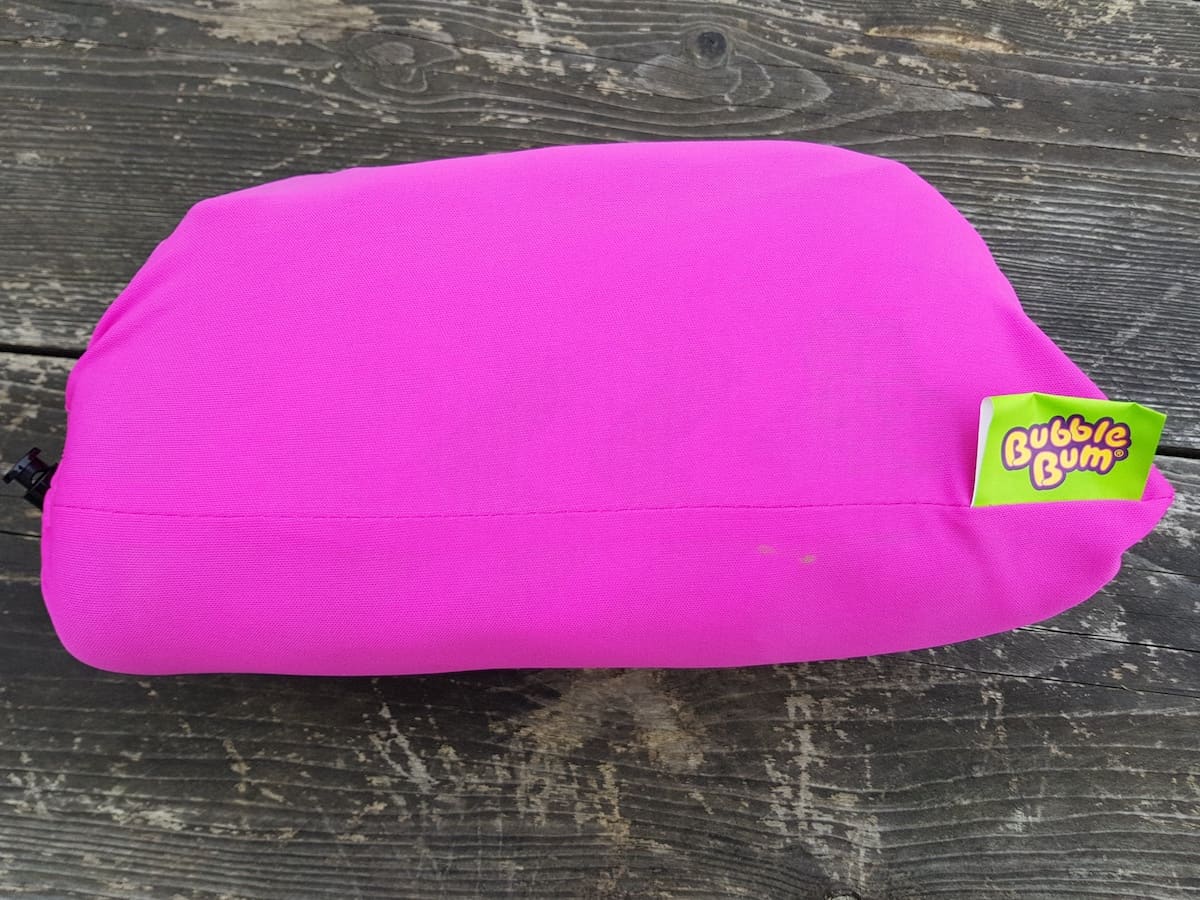 pink bag with bubblebum logo on a label attached to it 