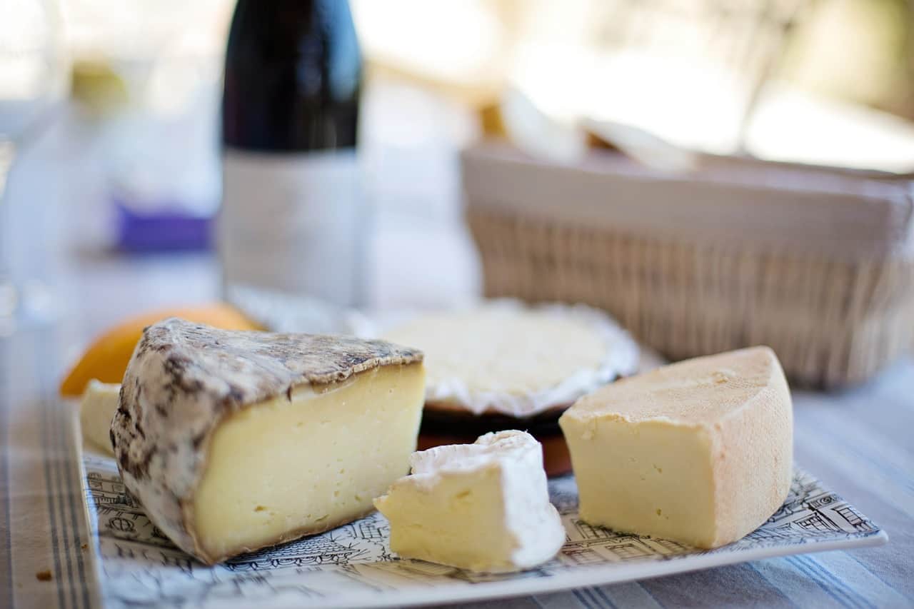 Giving up cheese is often the most difficult part of veganuary. Image of a plate of tempting cheese.