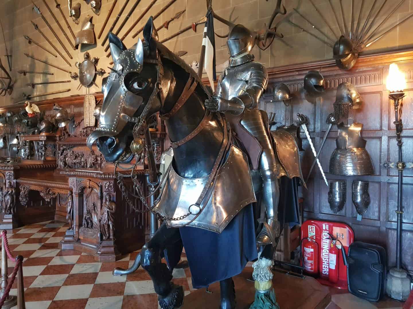horse statue in suit of armour in Warwick Castle Great Hall