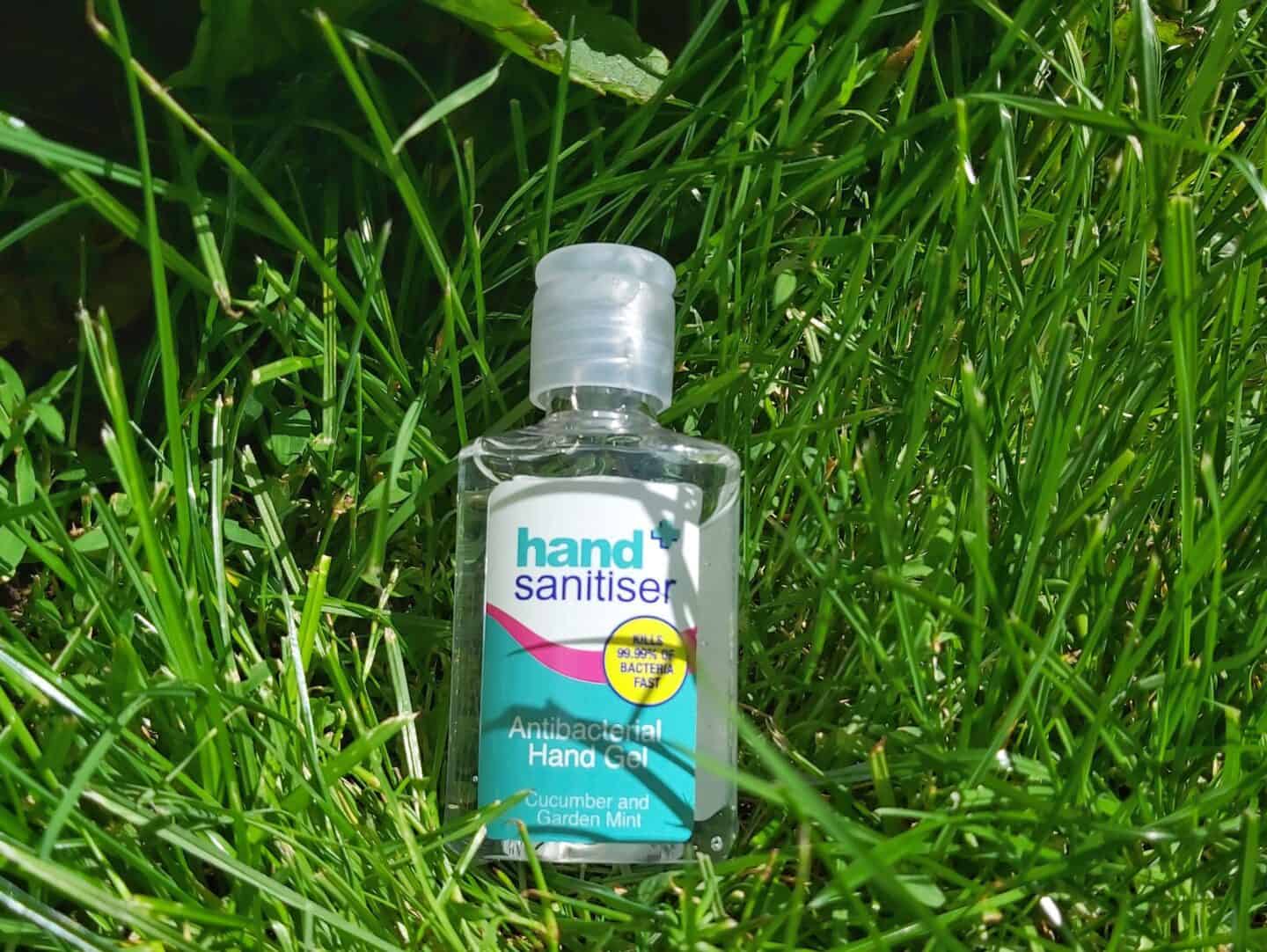 Safe and Sound Health hand gel lying in the grass