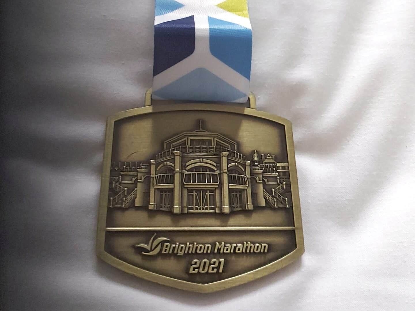 Brighton Marathon medal 2021 on a white background