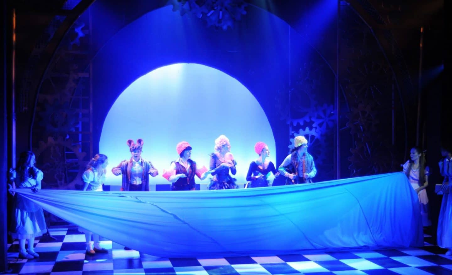 swimming through tears on stage in Alice in Wonderland at The Old Rep Theatre