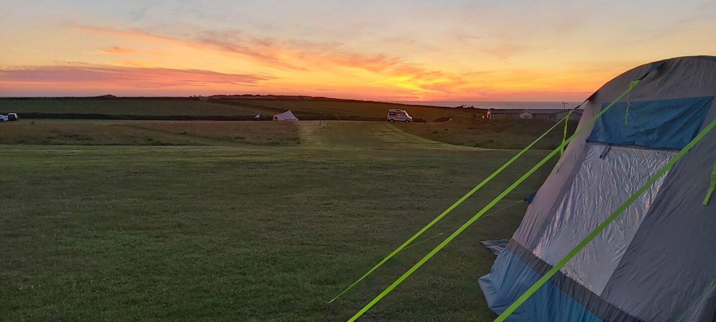 View of the sunset from our awning at Pencarnan Farm in Pembrokeshire