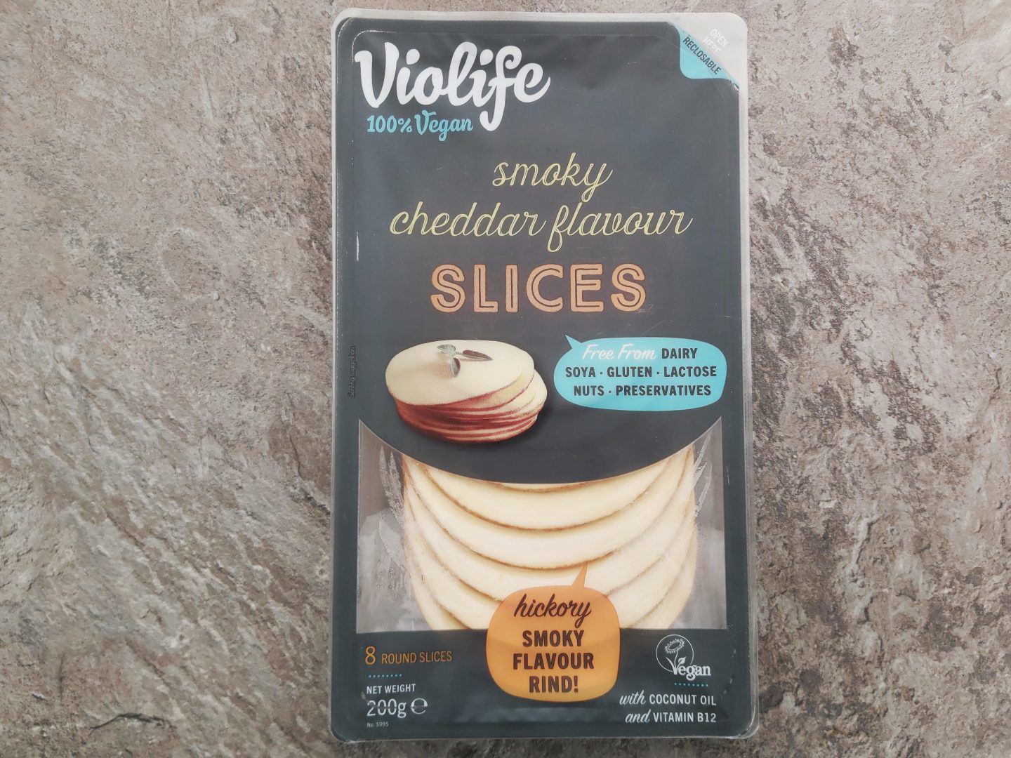 Packet of Violife smoky cheddar flavour slices