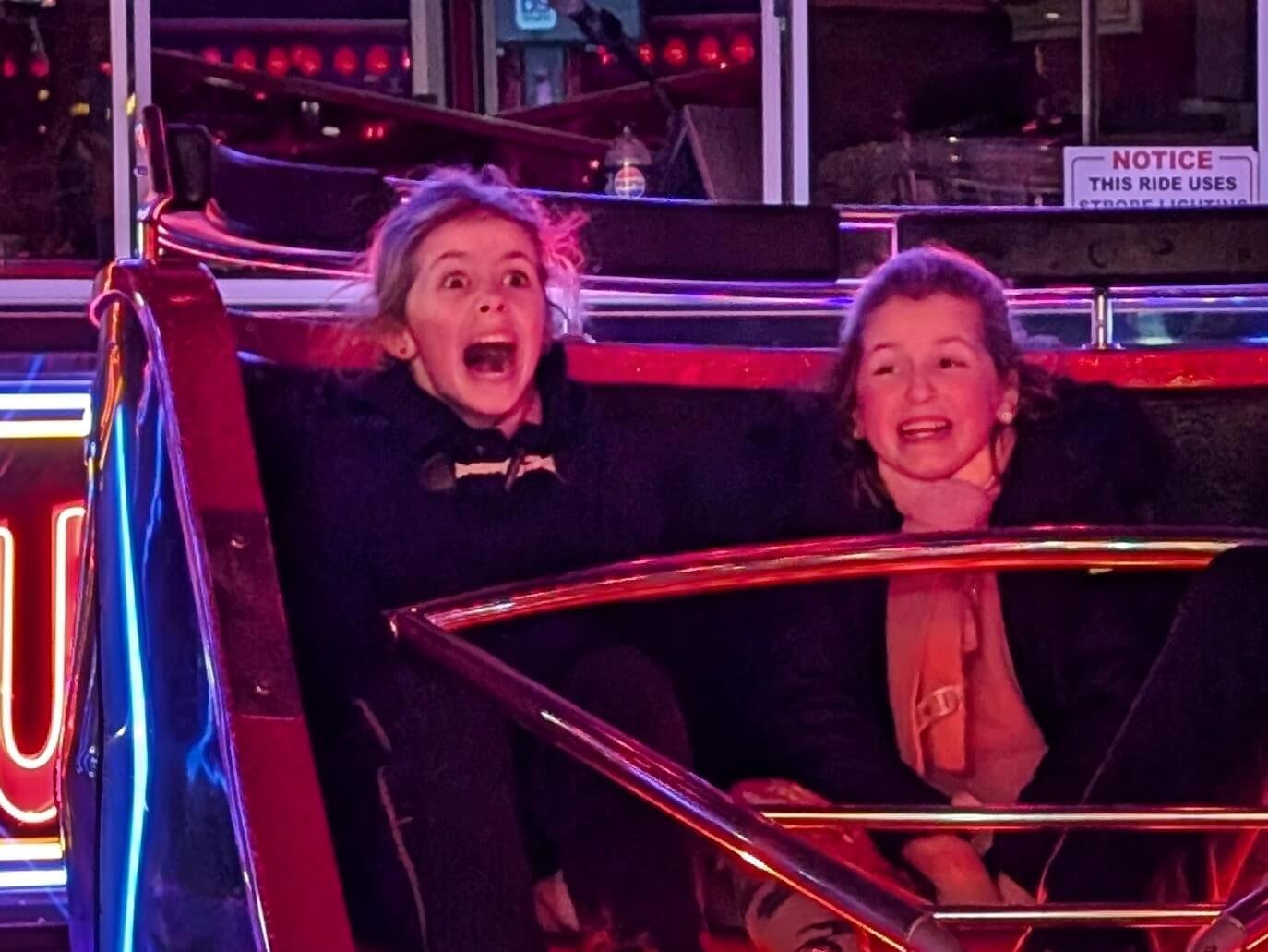 Two children on the waltzers at Winter Glow 2024