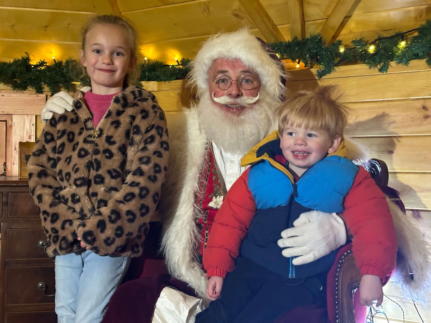 Very authentic Santa with two children at Magical Christmas Adventure at 4 Kingdoms Adventure & Farm Park