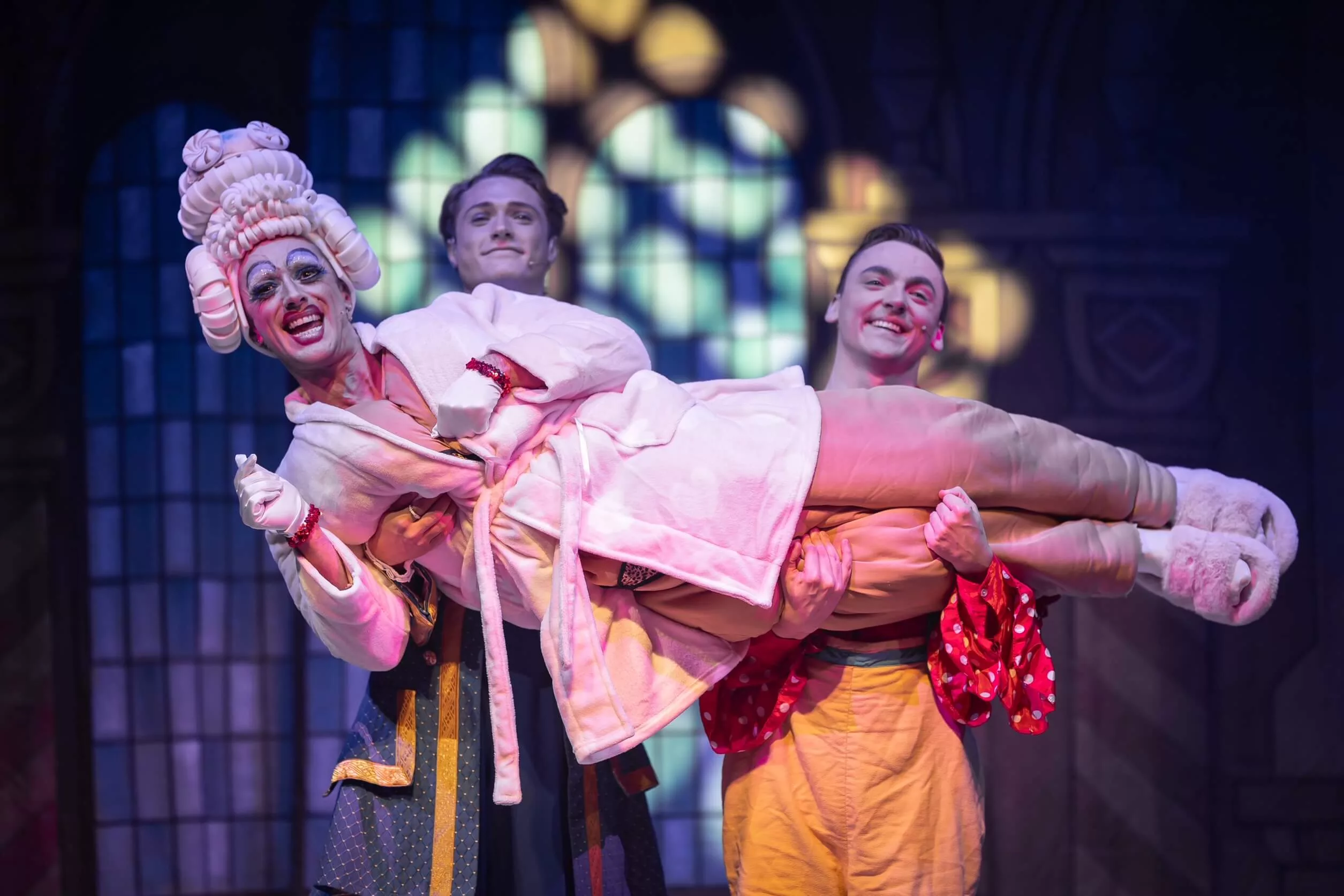 Professional performers on stage in the Ludlow Pantomime
