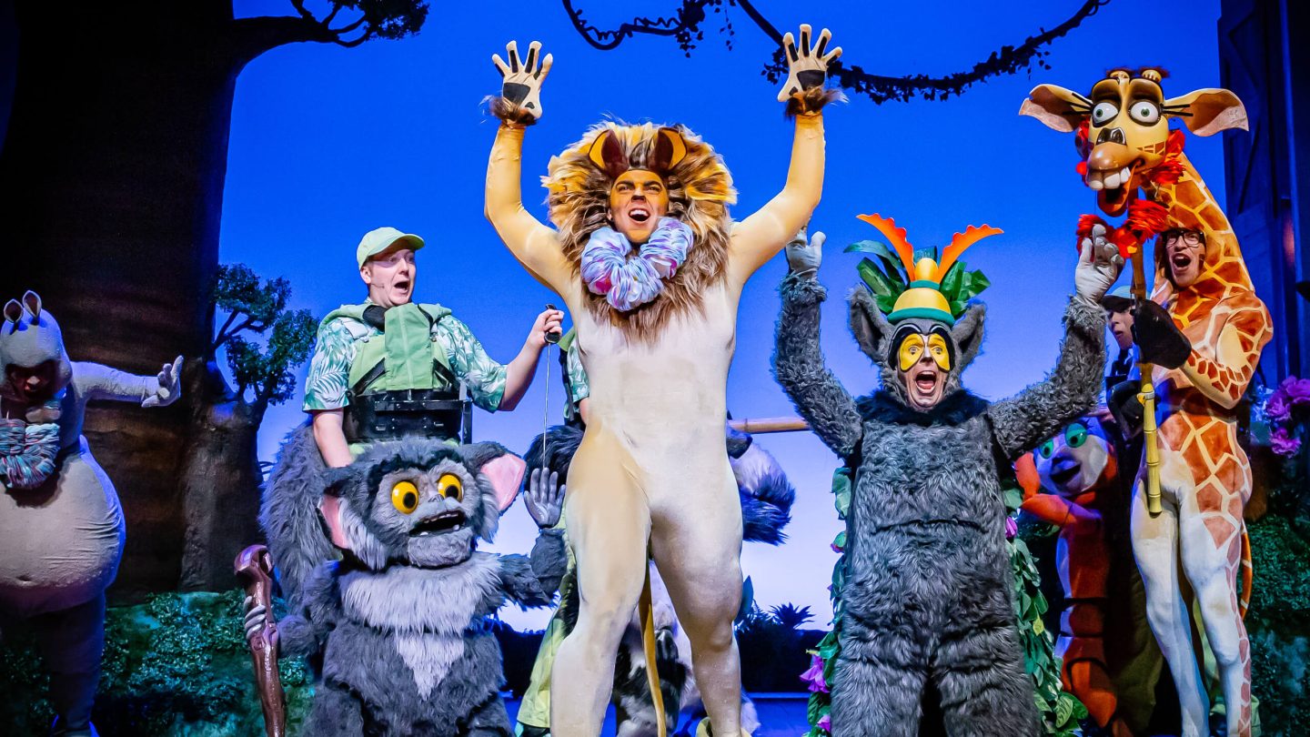 Alex and King Julian on stage in Madagascar the Musical at the Alexandra Theatre Birmingham