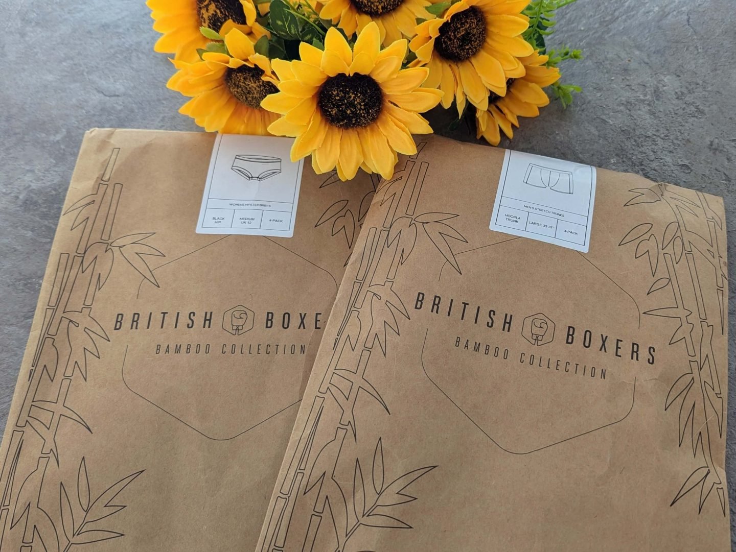 British Boxers brown paper packaging displayed with sunflowers