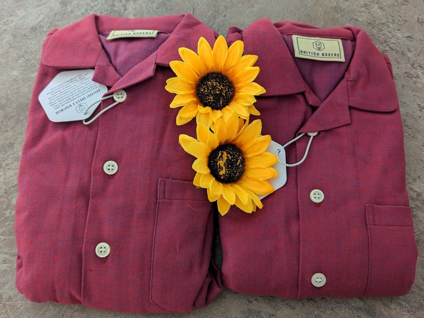 British Boxers children's rioja coloured pyjamas displayed with sunflowers