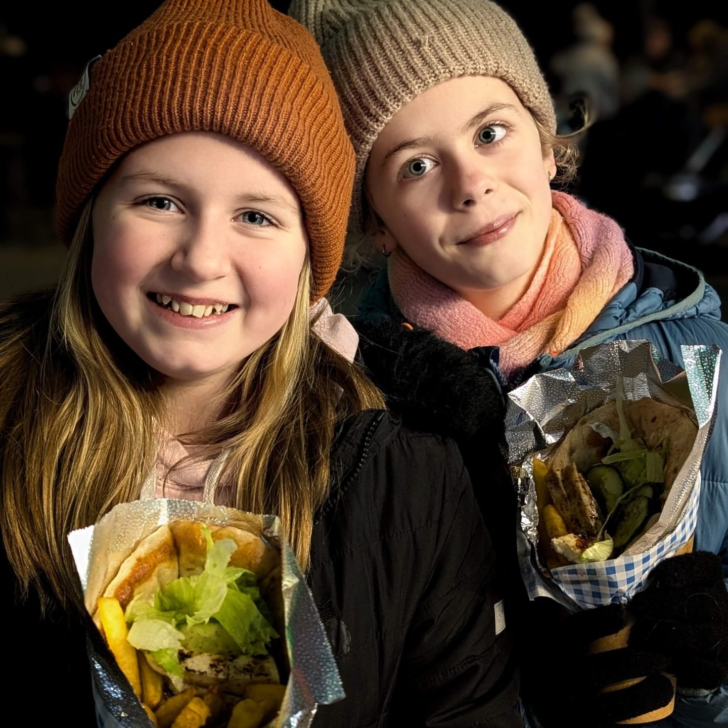 Libby and Lia holding gyros at Winter Glow Malvern Worcestershire 2025