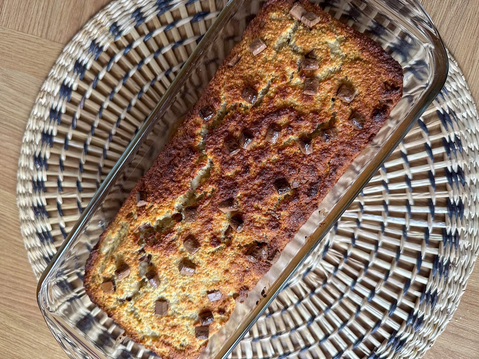 gluten free banana bread with chocolate chips photographed from above on an ornate plate