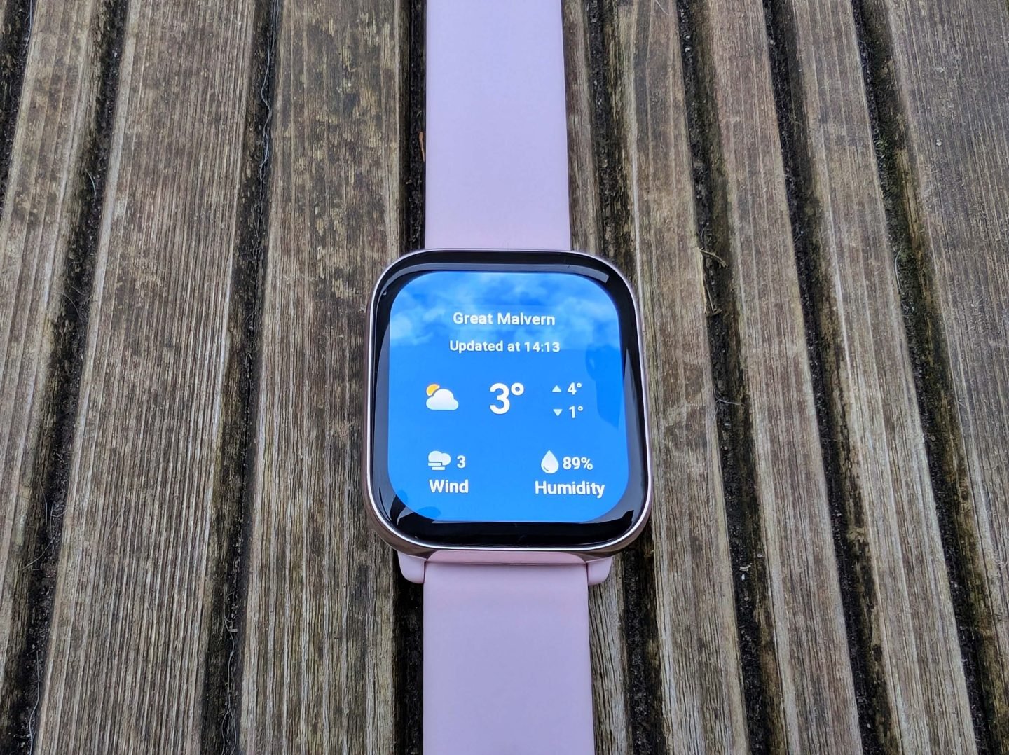 Amazfit Active smart watch displaying the weather