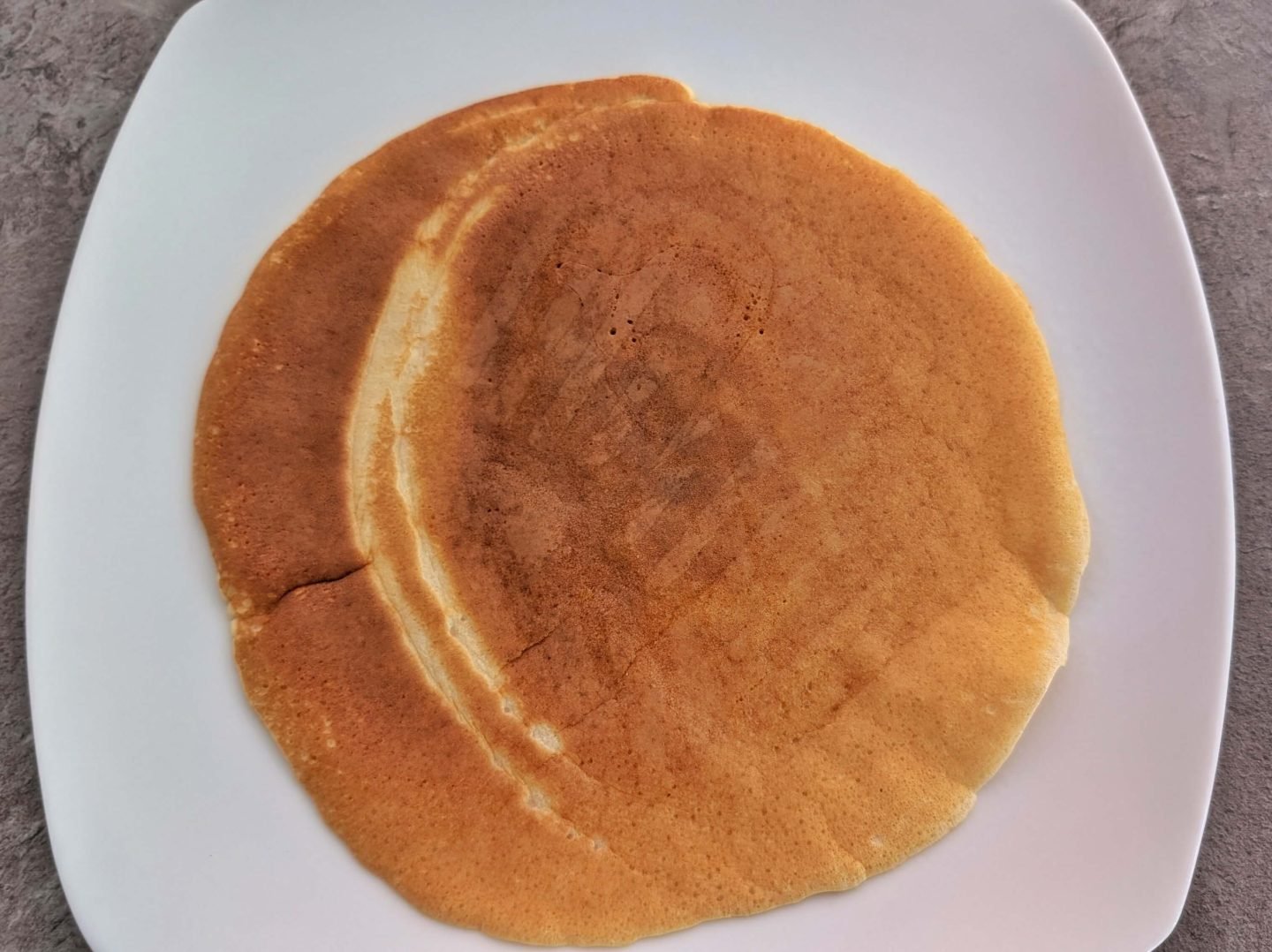 protein pancake on a white plate