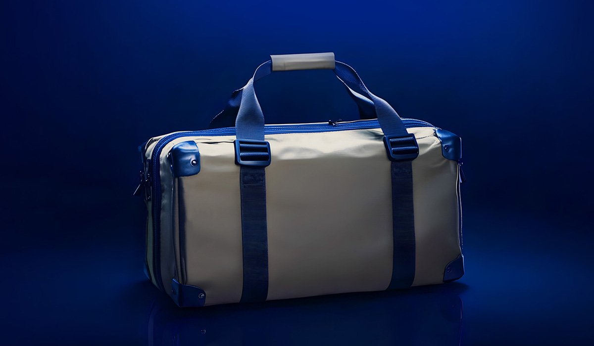 Beige and blue waterproof duffel bag