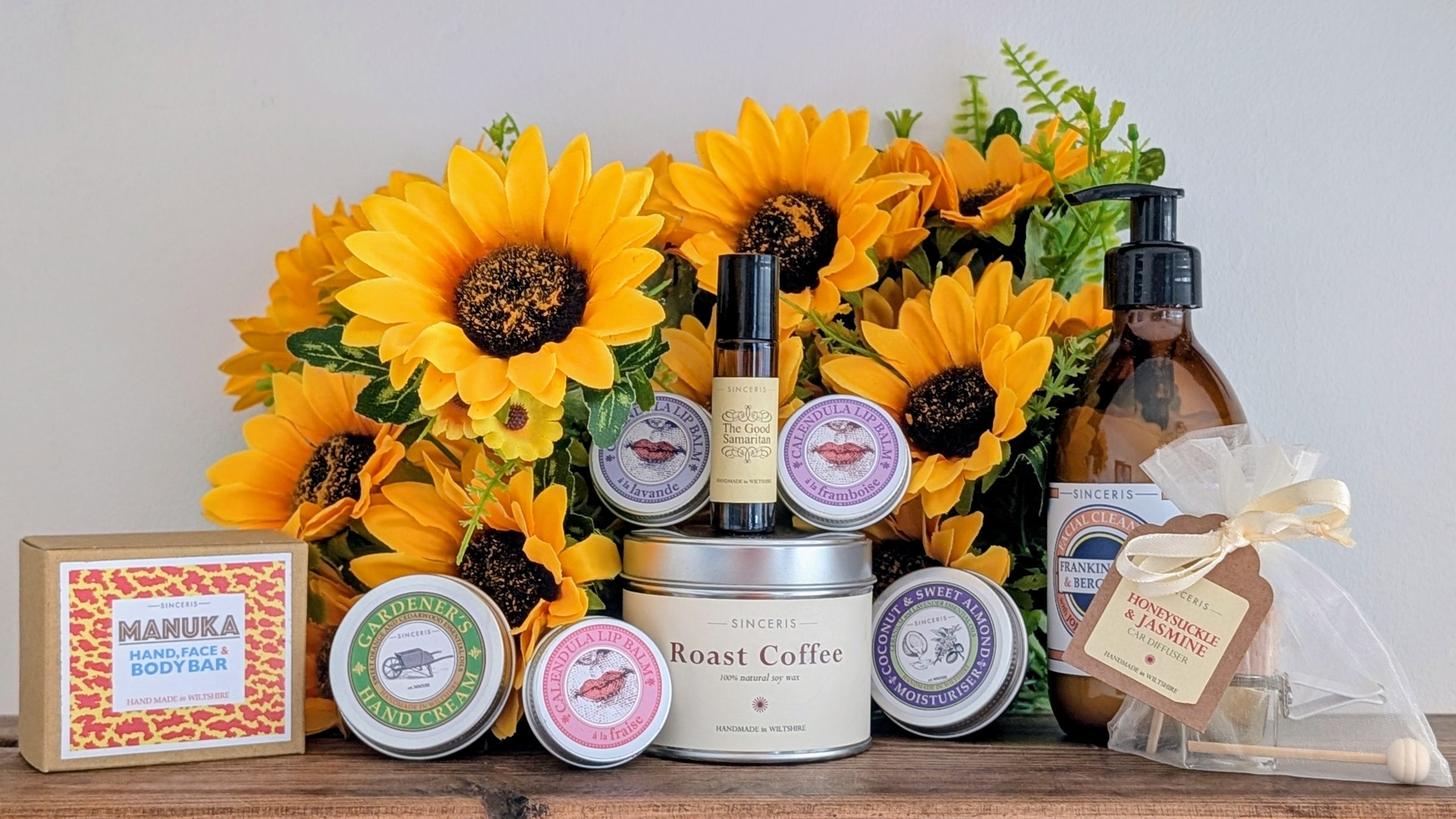 SINCERIS handmade range displayed against sunflowers