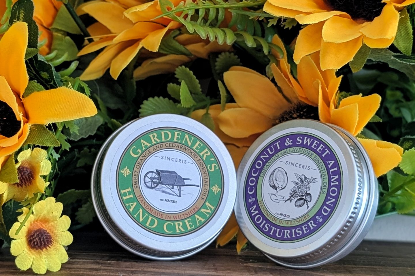 SINCERIS handmade range - moisturisers displayed against sunflowers