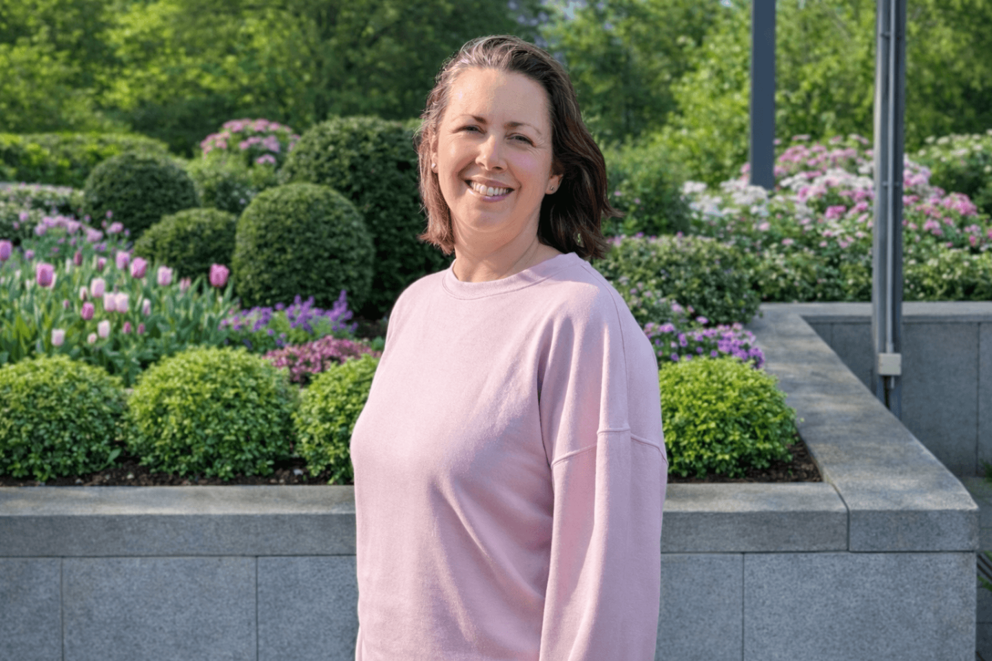Natalie in a pink cotton traders sweatshirt